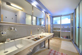 Bathroom with two shower units